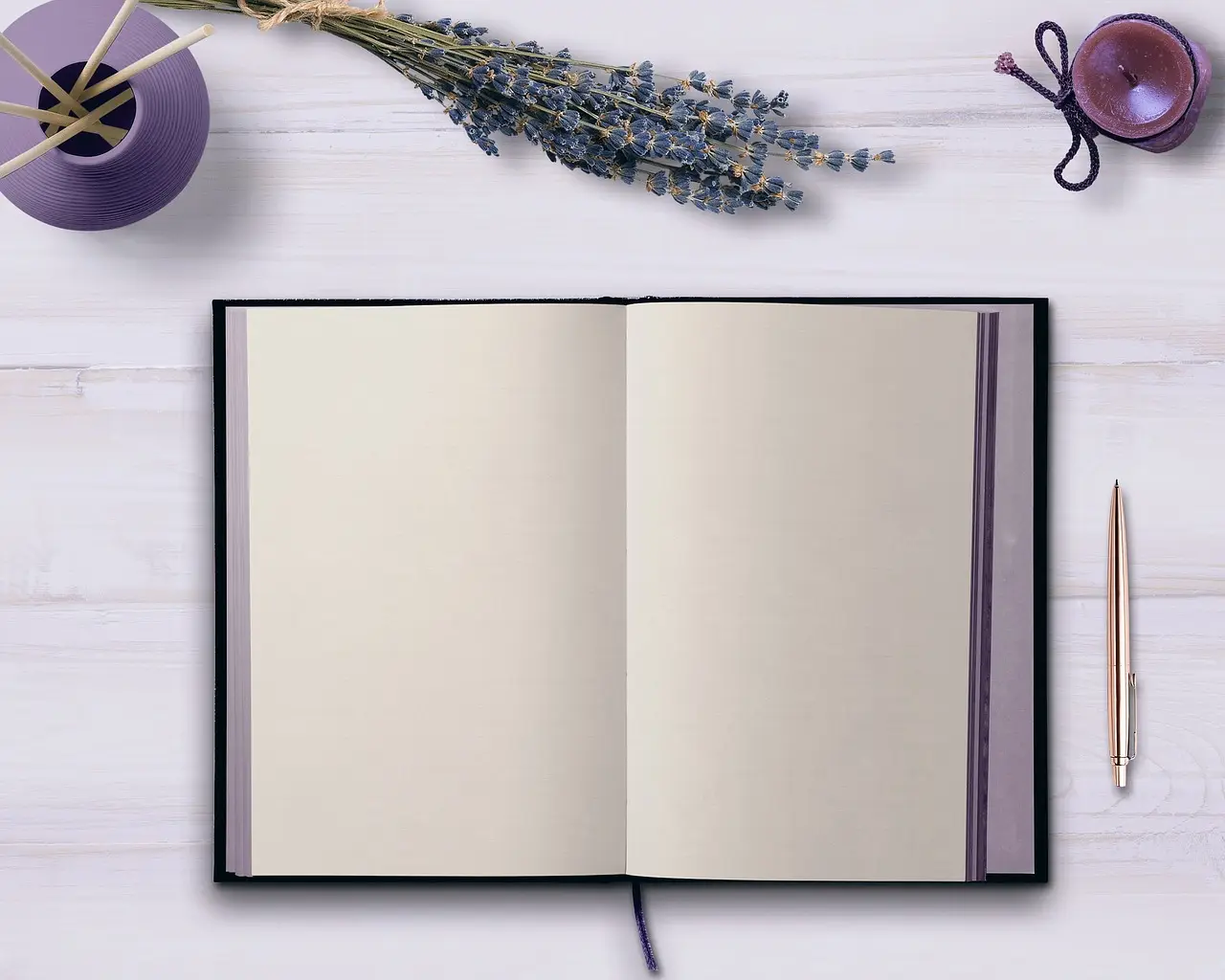 An open notebook on a wooden desk